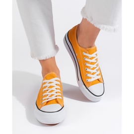 Gula klassiska damsneakers med snörning 1