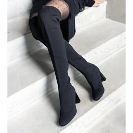 Svarta slip-on högklackade stövlar med en flexibel Flamme-överdel 1