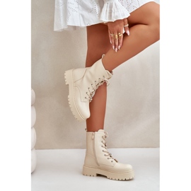 Isolerade kvinnors stövlar med beige stift 3