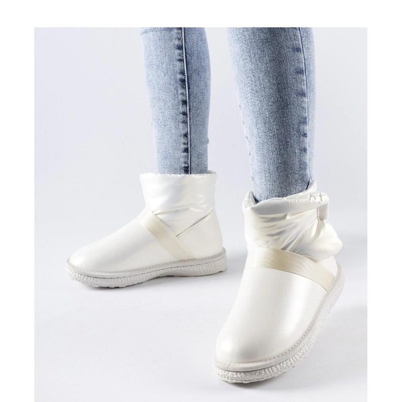 Beige blanka korta snökängor från Delaune - Solea 1