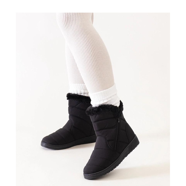 Svarta snökängor dekorerade med päls 1