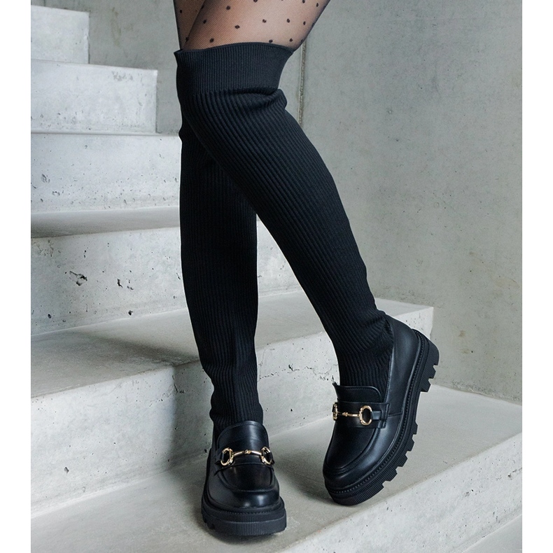 Svarta stövlar med flexibel ovandel och platt klack 1