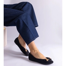 Svarta balettlägenheter dekorerade med rosett och brosch 1