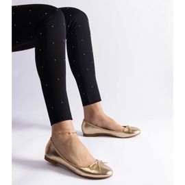 Ballerinaskor i guld dekorerade med rosett gyllene 1