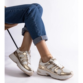 Vita och guld sport sneakers gyllene 1