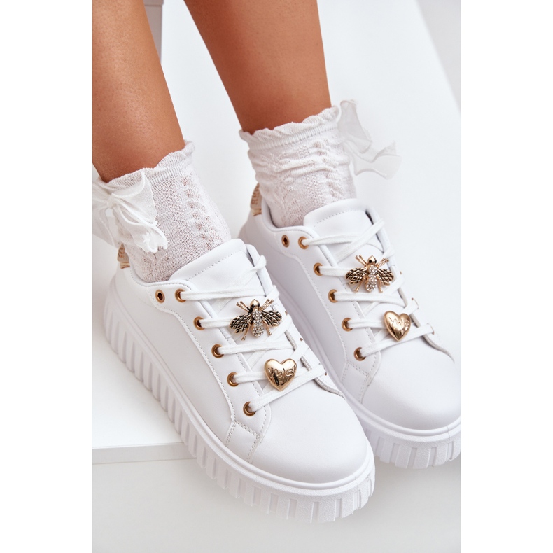 Kvinnors sneakers med vita stift 2