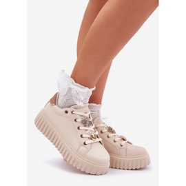 Kvinnors sneakers med stift beige 1