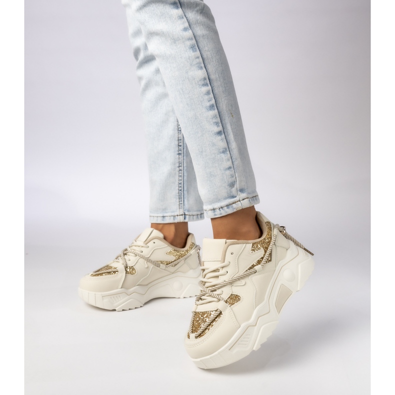 Kvinnosportsneakers beige-guld 1