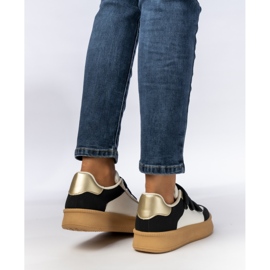 Kvinnors sneakers med metalliska svartvita skär 1