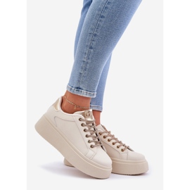 Sneakers på en plattform med dekorativa strängar beige 1