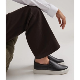 Towns Svarta genombrutna slip-on sneakers 2