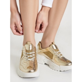 Kvinnors sneakers lumina guld gyllene 1
