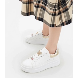 Kvinnors sneakers azora guld gyllene 1