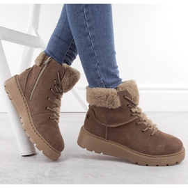 Kvinnors läderstövlar med päls på den bruna plattformen Rieker 70402-24 beige 4
