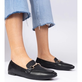 Svarta loafers med en gyllene dekoration och zirkon 1