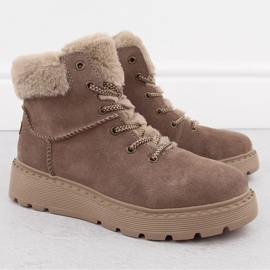 Kvinnors läderstövlar med päls på den bruna plattformen Rieker 70402-24 beige 2