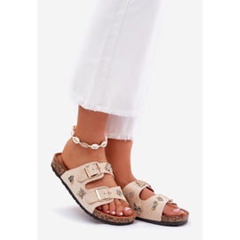 Kvinnors tofflor på en korksula med spännen och stift beige 1