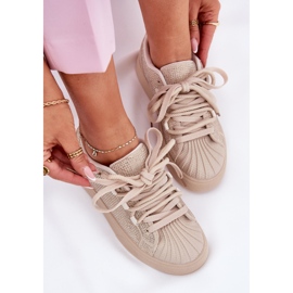 Kvinnors sneakers med dekoration på plattformen beige 11
