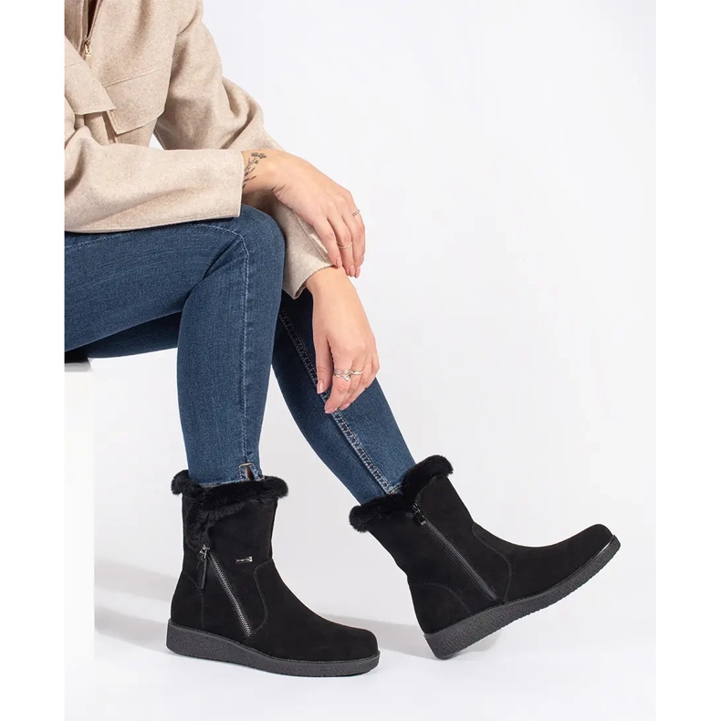 Damisolerade svarta läderstövlar med päls från Sergio Leone 1