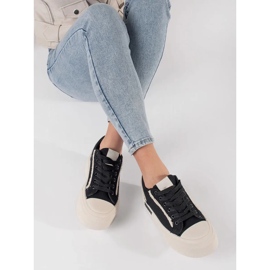 Svarta och vita plattformssneakers 3