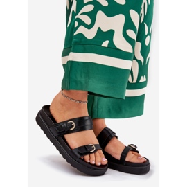 Kvinnors flip flops på plattformen med gyllene klämmor svart 1