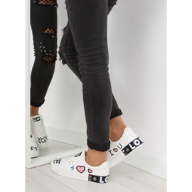 Vita sneakers med T302 Vita inskriptioner 1