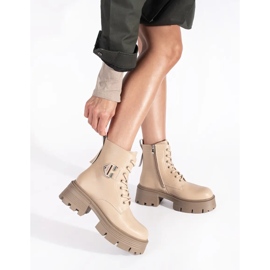 Ankelboots i beige läder med tjock sula 1