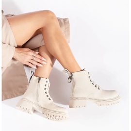 Damstövlar i beige läder med snörning 1