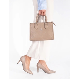 Klassiska, eleganta beige högklackade pumps 2