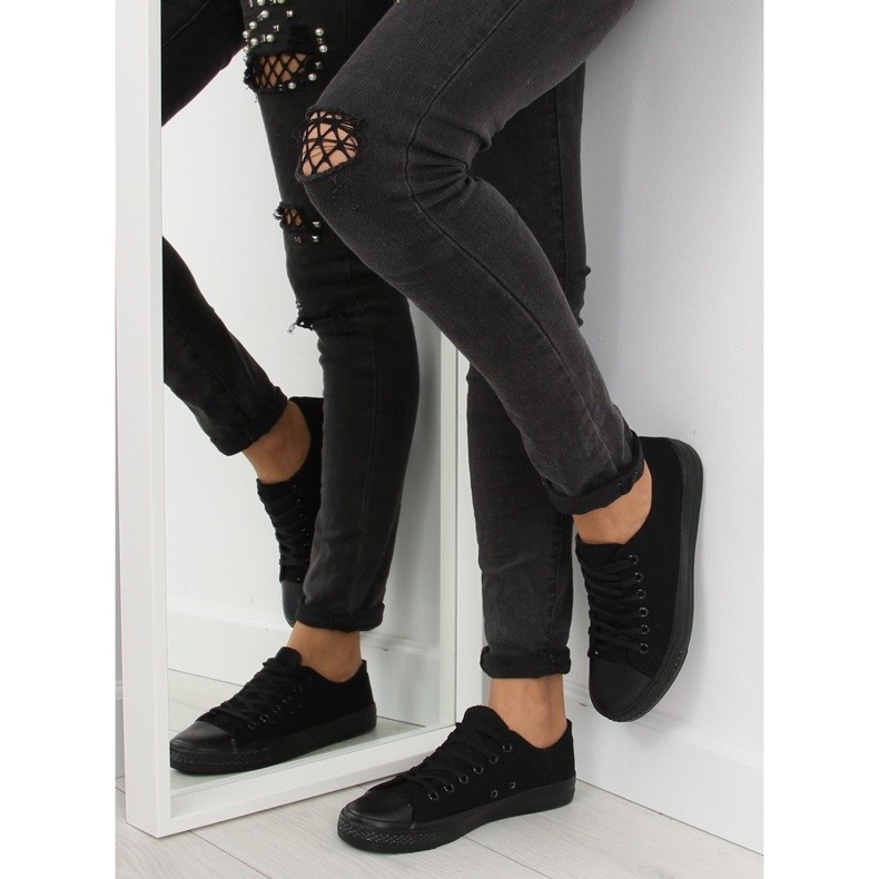Svarta svarta enfärgade sneakers för kvinnor 1