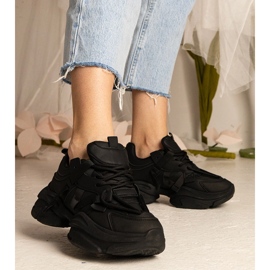 Svarta sneakers kvinnors massiva sporter 1