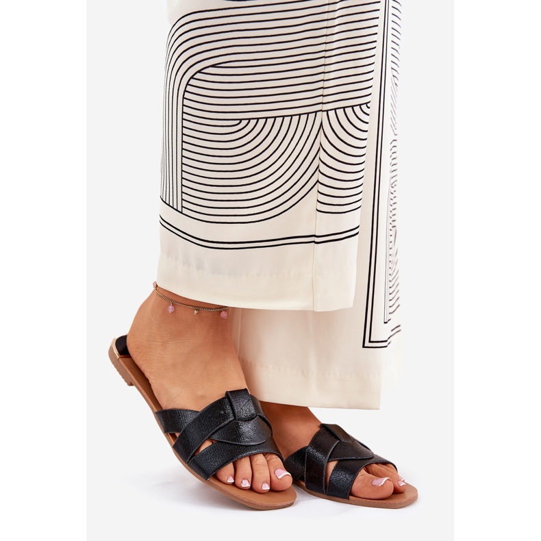 Platta kvinnors flip flops med svarta ränder 1