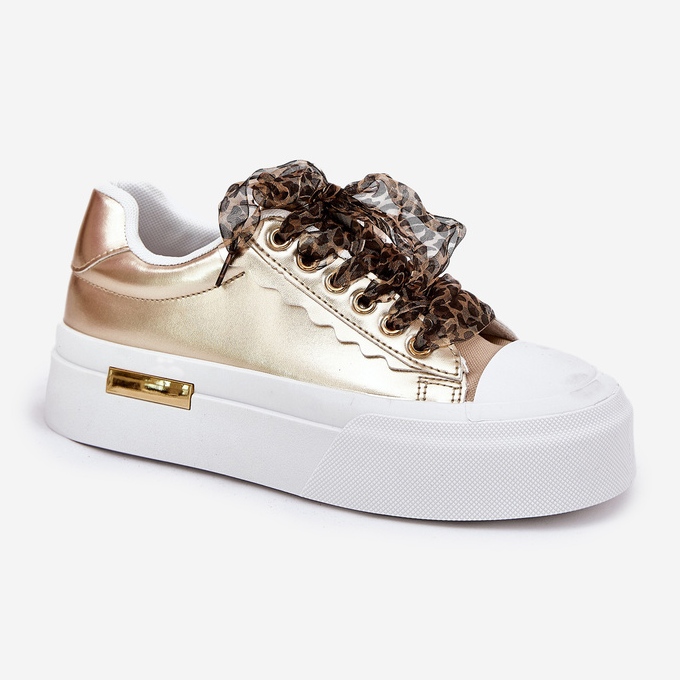 Kvinnors sneakers på en massiv plattform med dekorativt snörguld gyllene 2