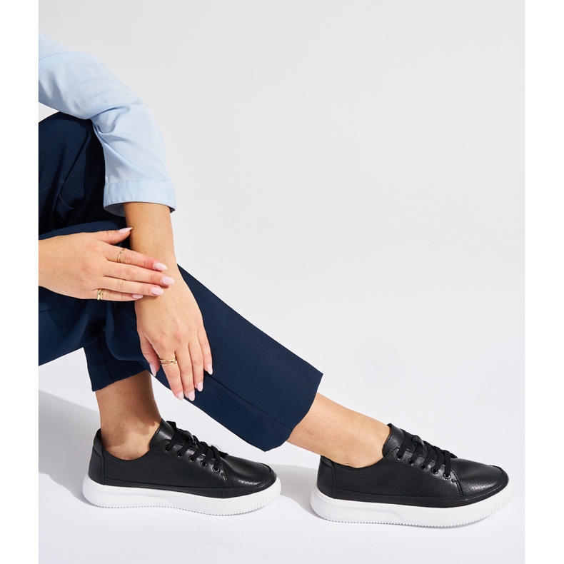 Genombrutna svarta sneakers i läder från Sergio Leone 1