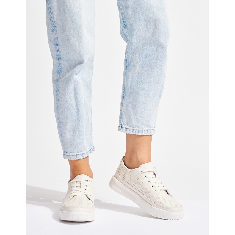 Genombrutna vita sneakers i läder från Sergio Leone 1