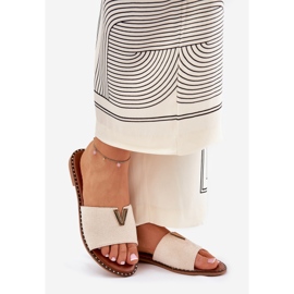 Flat -hanterade kvinnors flip flops med dekorativa detaljer beige 1