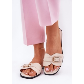 Platta kvinnors flip flops med en gyllene beige klämma 2