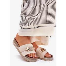 Kvinnors flip flops med en gyllene detalj på plattformen med glitter beige 1