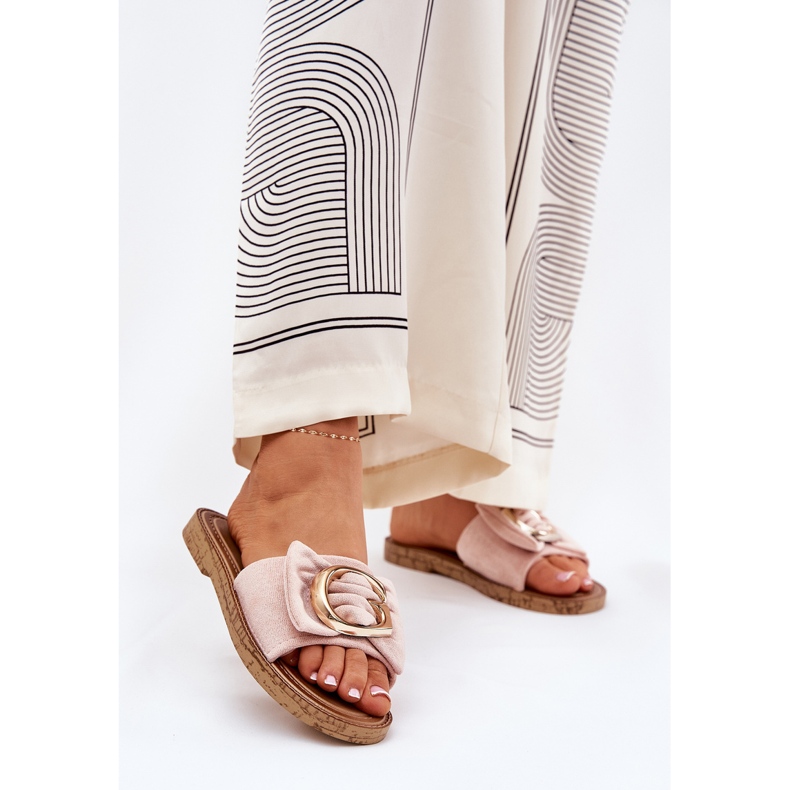 Platta kvinnors flip flops med en dekorativ rosa detalj 2