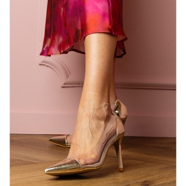 Guldklassiska pumpar med en transparent övre gyllene 1