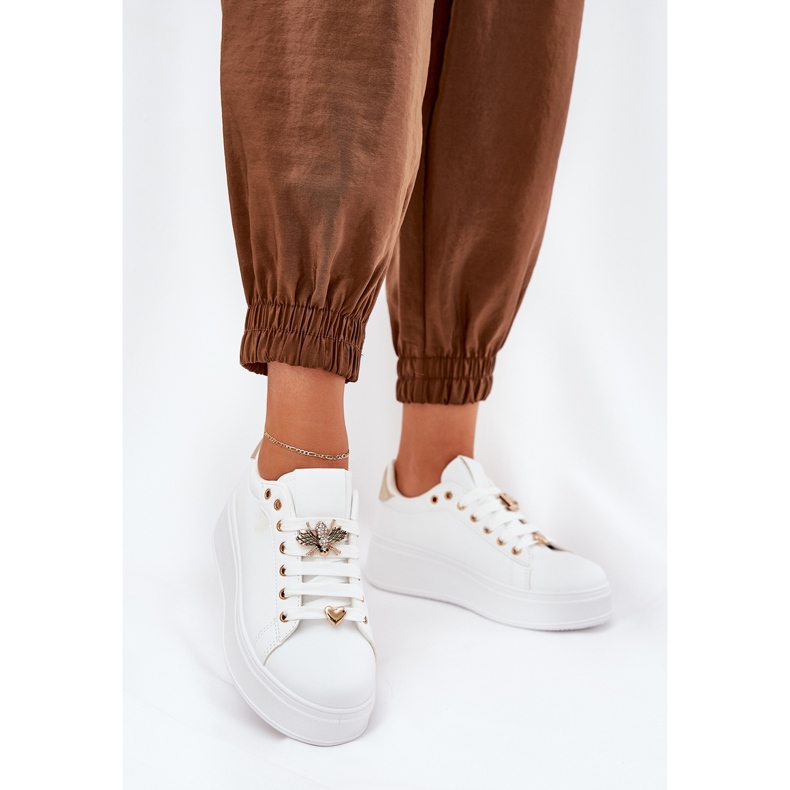 Kvinnors sneakers på plattformen med vita stift 2