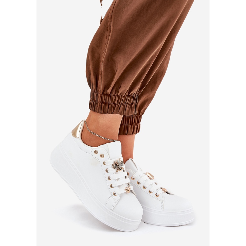 Kvinnors sneakers på plattformen med vita stift 1