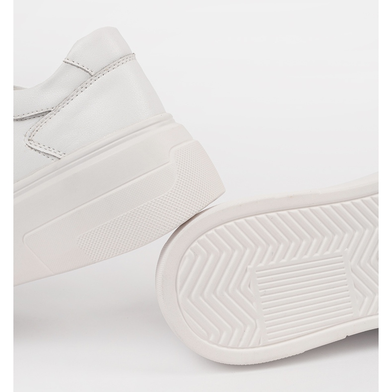 Vita sneakers på Sergio Leone läderplattform 1