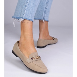 Bruna loafers med en matt finish med en gyllene dekoration 1