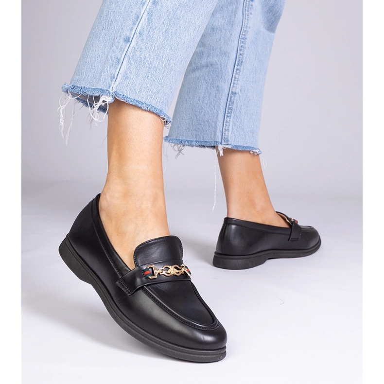 Svarta loafers med gulddekor 1