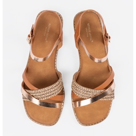 Bruna kvinnors sandaler på en platt sula Sergio Leone 1