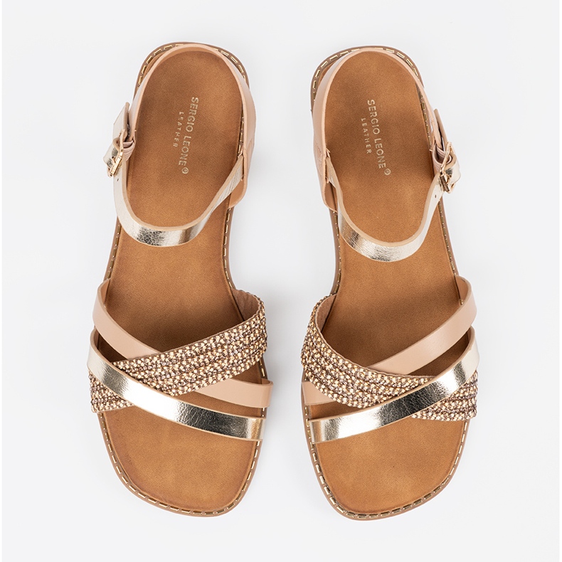 Gyllene kvinnasandaler på en platt sula Sergio Leone 2