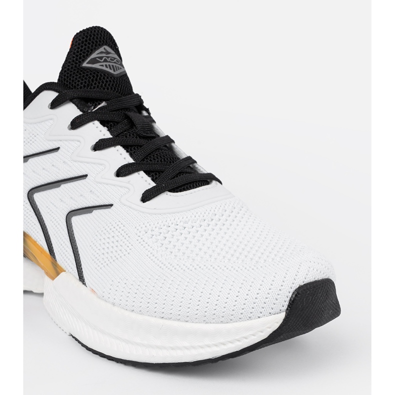 Vico Vita och vita kvinnors sportskor med ett orange element 1