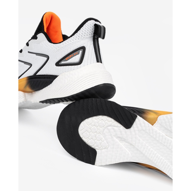 Vico Vita och vita kvinnors sportskor med ett orange element 2