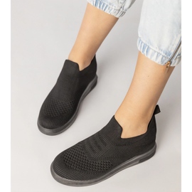 Svarta sockens sneakers infogade 4